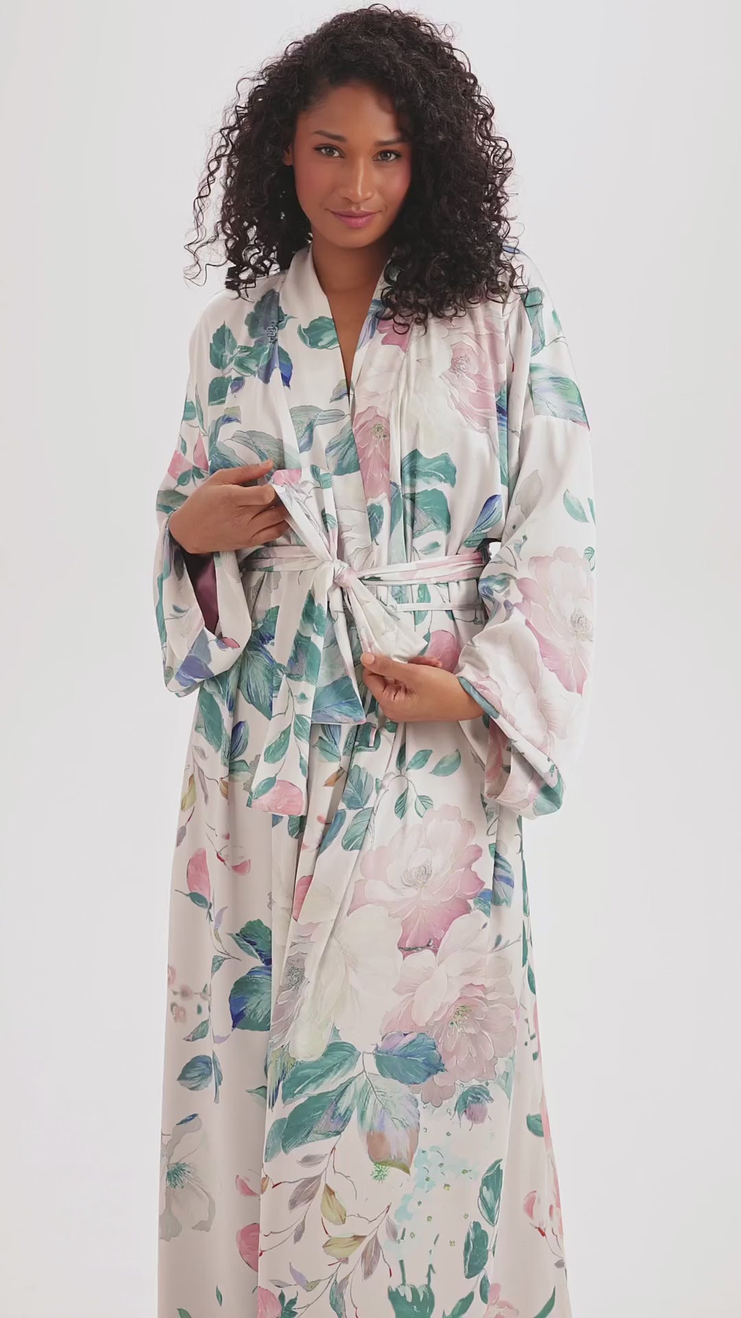 Model Renee wearing Queens Wear Robes Floral Dreams robe in a product video